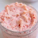Pink whipped strawberry butter in a ceramic bowl