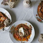 Long string beans in Thai curry tomato sauce with poached egg