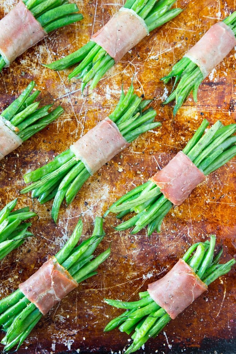 Baked green bean bundles on a sheet pan