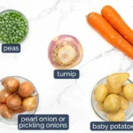 Vegetables for lamb navarin arranged on marble