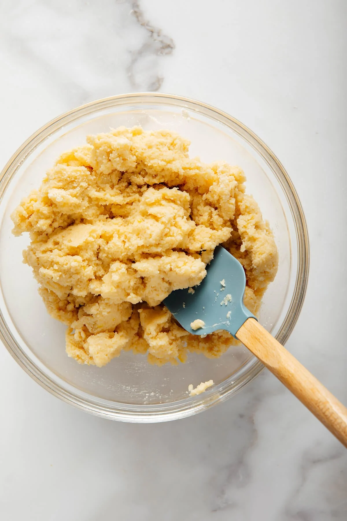 Crumbly almond flour cobbler topping before it goes into the oven