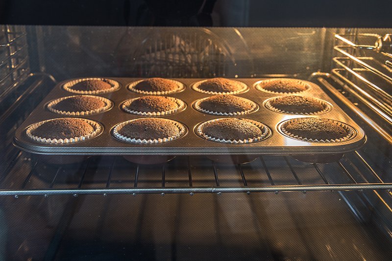 Chocolate zucchini cupcakes baking in the oven